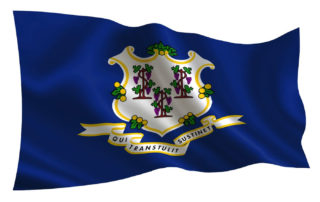 Flag of Connecticut featuring a white shield with three grapevines and the state motto "Qui Transtulit Sustinet" on a blue background.