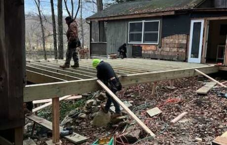 Framing crew constructs foundation for kitchen addition