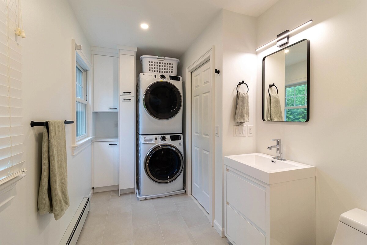 Laundry area in common bathroom remodel