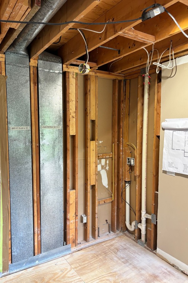 Open wall and floor conditions coordinated during a Connecticut kitchen renovation